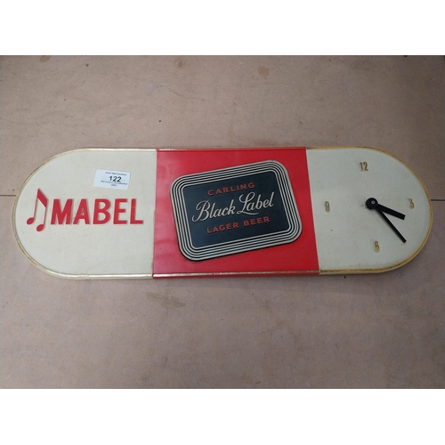 122 - Mabel Black Label battery operated advertising clock. {15 cm H x 46 cm W}.