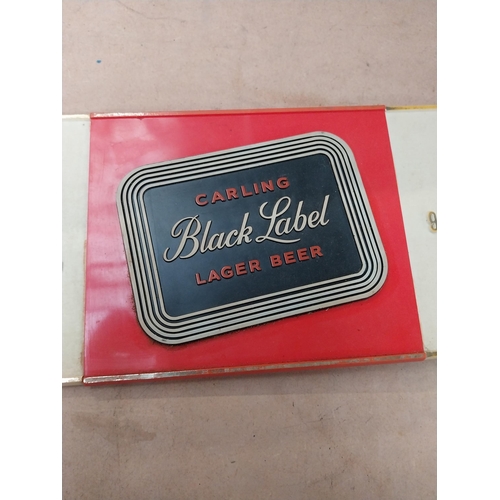 122 - Mabel Black Label battery operated advertising clock. {15 cm H x 46 cm W}.