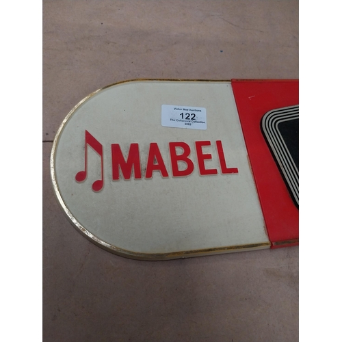 122 - Mabel Black Label battery operated advertising clock. {15 cm H x 46 cm W}.