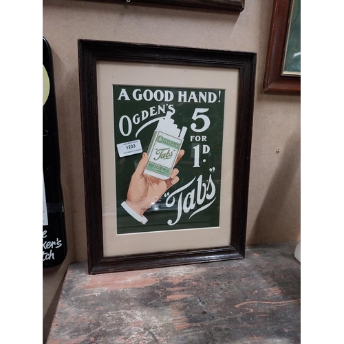 1233 - A Good Hand Ogden's Tabs framed advertising print {37cm H X 28cm W}.