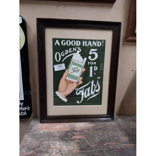 1233 - A Good Hand Ogden's Tabs framed advertising print {37cm H X 28cm W}.