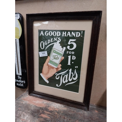 1233 - A Good Hand Ogden's Tabs framed advertising print {37cm H X 28cm W}.