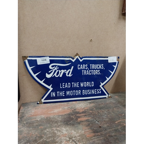 1236 - Ford Cars Lead the World enamel advertising sign. {17 cm H x 35 cm W}.