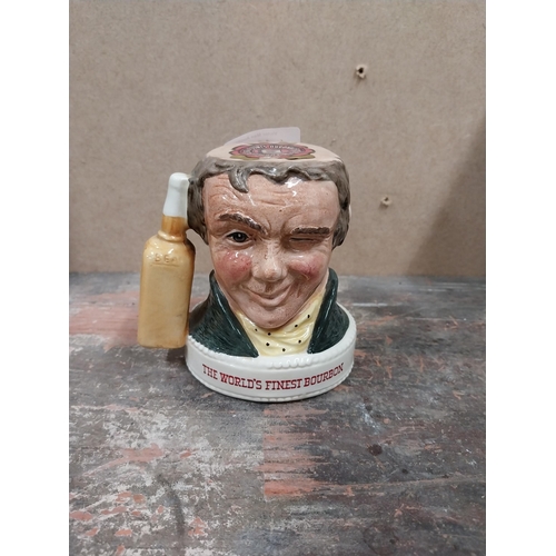 1239 - Jim Beam Royal Doulton ceramic advertising figure. {10 cm H x 10 cm W x 7 cm D}.