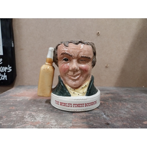 1239 - Jim Beam Royal Doulton ceramic advertising figure. {10 cm H x 10 cm W x 7 cm D}.