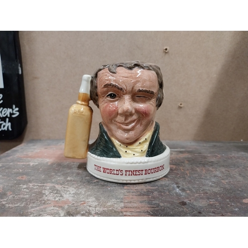 1239 - Jim Beam Royal Doulton ceramic advertising figure. {10 cm H x 10 cm W x 7 cm D}.