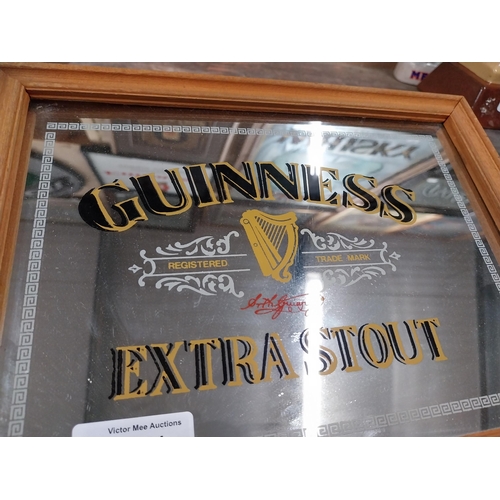 1241 - Guinness Extra Stout framed advertising mirror {21 cm H x 27 cm W}.