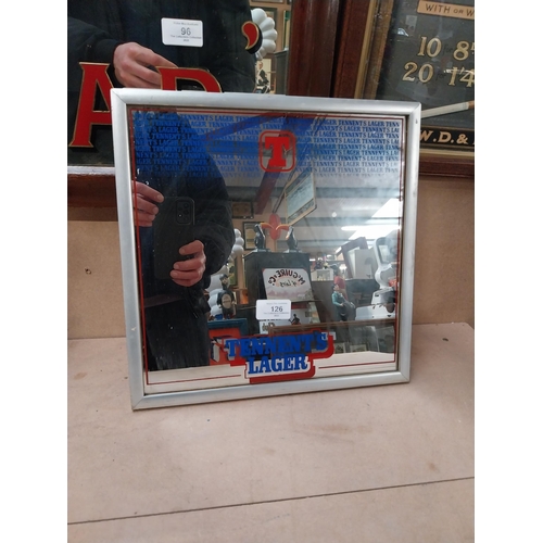 126 - Tennents Lager framed advertising mirror. {22 cm H x 23 cm W}.