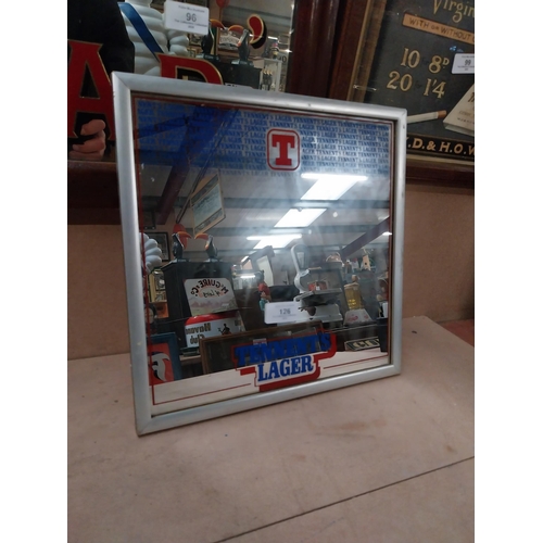 126 - Tennents Lager framed advertising mirror. {22 cm H x 23 cm W}.