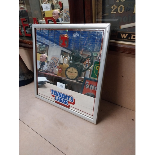 126 - Tennents Lager framed advertising mirror. {22 cm H x 23 cm W}.