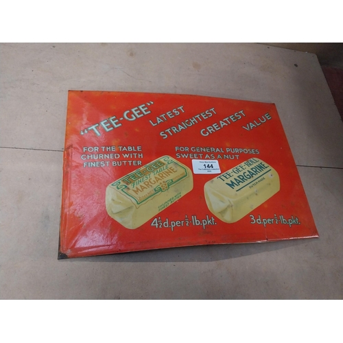 144 - Tee Gee Margarine celluloid advertisement. {23 cm H x 32 cm W}.