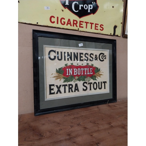 15 - Guinness and Co's in Bottle Extra Stout framed showcard. {60 cm H x 75 cm W}.