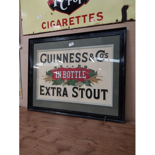 15 - Guinness and Co's in Bottle Extra Stout framed showcard. {60 cm H x 75 cm W}.