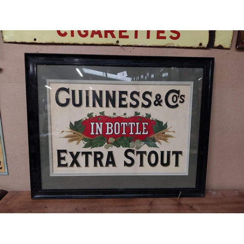 15 - Guinness and Co's in Bottle Extra Stout framed showcard. {60 cm H x 75 cm W}.