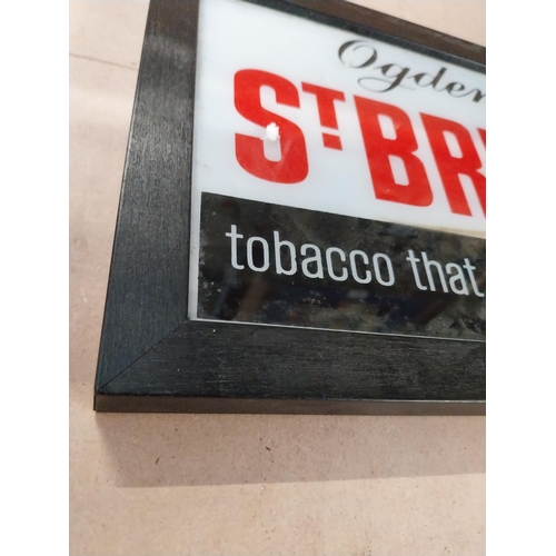 155 - Ogden's Bruno tobacco reverse painted glass advertising sign {21 cm H x 29 cm W}.