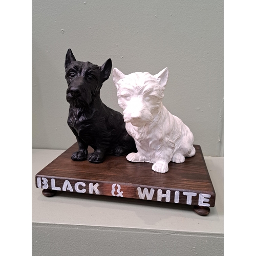 159 - Black and White Scotch Whisky advertising dogs on wooden base. H 23cm x W 28cm x D 22cm