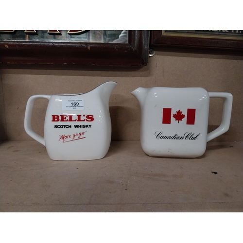 169 - Bell's Scotch Whiskey and Canadian Club Wade ceramic water jugs. {15 cm H x 17 cm W x 12 cm D and 14... 