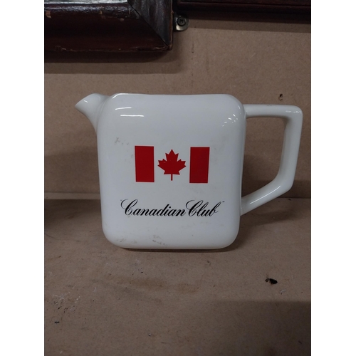 169 - Bell's Scotch Whiskey and Canadian Club Wade ceramic water jugs. {15 cm H x 17 cm W x 12 cm D and 14... 