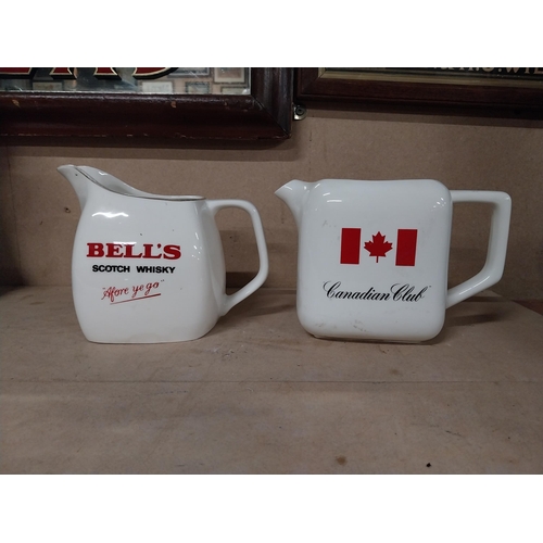 169 - Bell's Scotch Whiskey and Canadian Club Wade ceramic water jugs. {15 cm H x 17 cm W x 12 cm D and 14... 