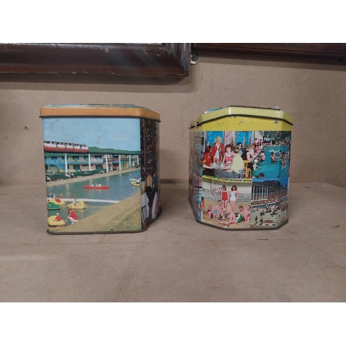 192 - Two Butlin�s Holiday Camp tin plate advertising tins one with tea leaves. {11 cm H x 16 cm W x 10 cm... 