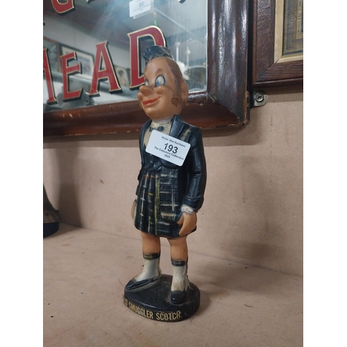 193 - Old Smugglers Scotch Whiskey rubberoid advertising figure. {25 cm H x  10 cm W x 7 cm D}