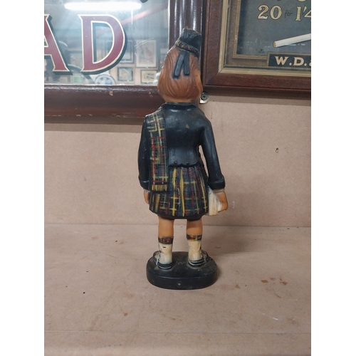 193 - Old Smugglers Scotch Whiskey rubberoid advertising figure. {25 cm H x  10 cm W x 7 cm D}