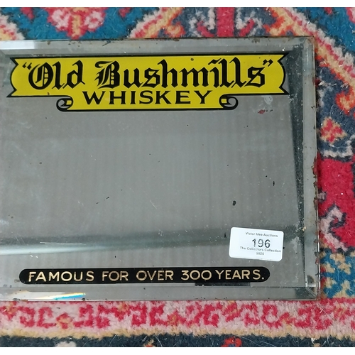 196 - Old Bushmills Whiskey advertising mirror. {20 cm H x 25 cm W}.