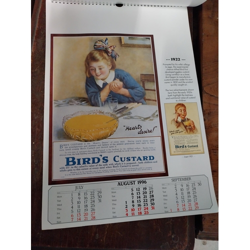 2 - 1996 Guinness calendar {50 cm H x 35 cm W}  and four Guinness postcards.