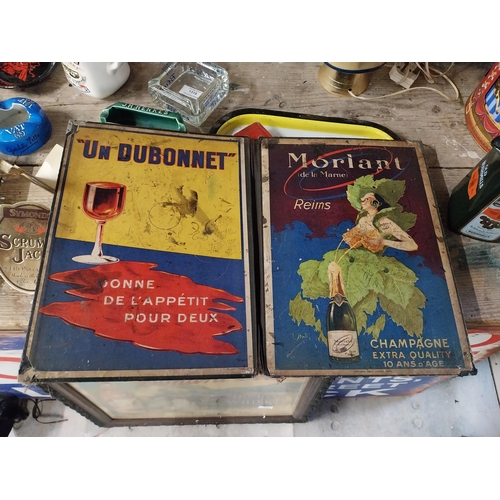 20 - Un Dubonnet and Morlant Champange advertising prints in cardbord holder. {20 cm H x 54 cm W}.