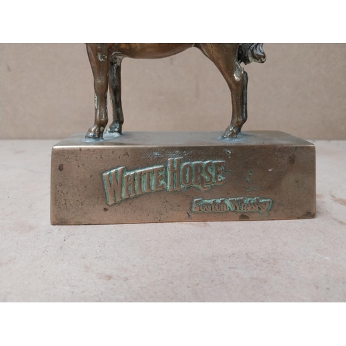 201 - Rare brass White Horse advertising figure. {15cm H x 12cm W x 5cm D}.