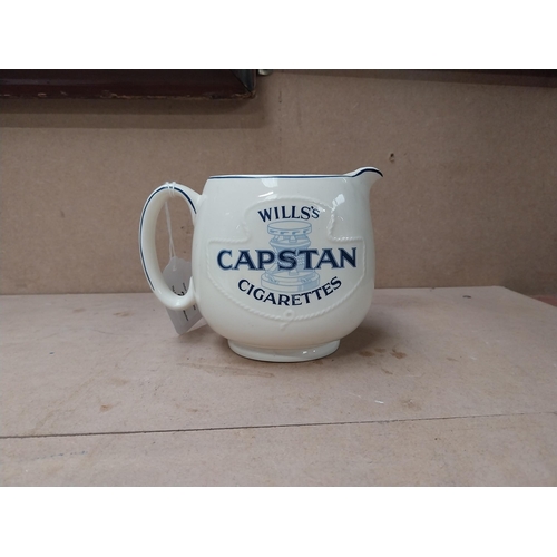 203 - Wills's Capstan advertising water jug. {11 cm H x 16 cm Dia}.