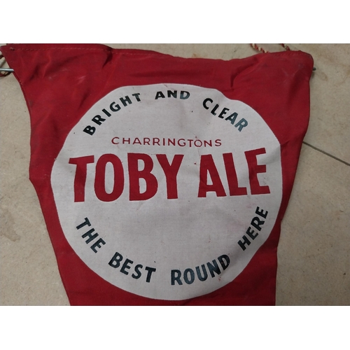 209 - Carling Black Label banner on stand {34 cm x 11 cm W} and Toby Ale adverising banner {28 cm H x 17 c... 