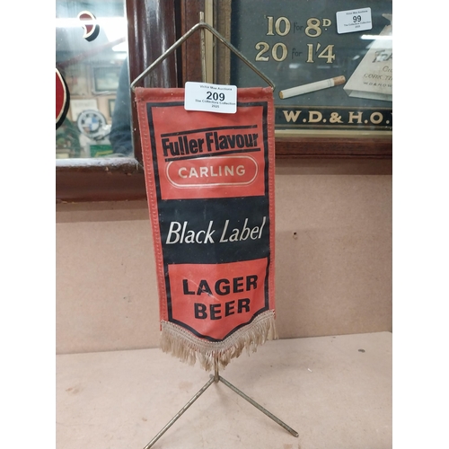 209 - Carling Black Label banner on stand {34 cm x 11 cm W} and Toby Ale adverising banner {28 cm H x 17 c... 