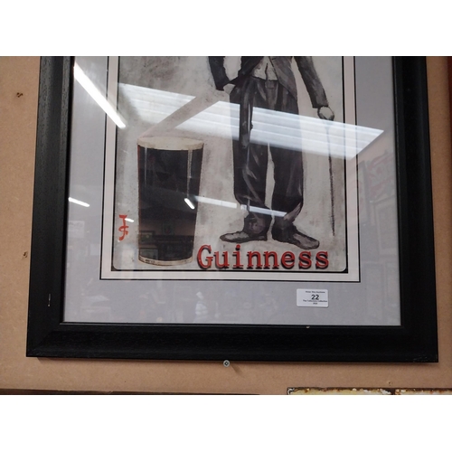 22 - Framed Charlie Chaplin Guinness advertising print. {66 cm H x 50 cm D}.