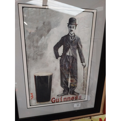 22 - Framed Charlie Chaplin Guinness advertising print. {66 cm H x 50 cm D}.