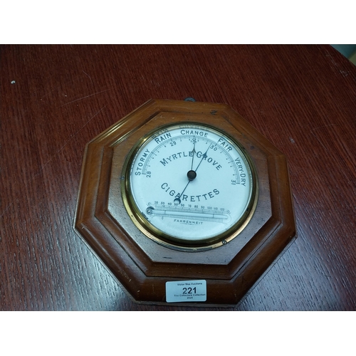 221 - Myrtle Grove Cigarettes mahogany and brass barometer. {24 cm Dia.}.