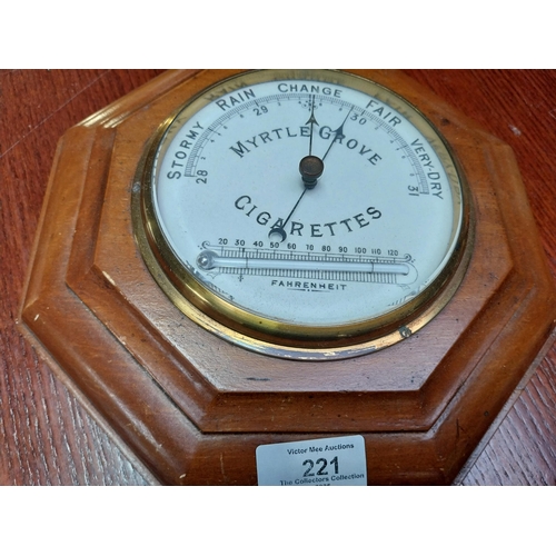 221 - Myrtle Grove Cigarettes mahogany and brass barometer. {24 cm Dia.}.