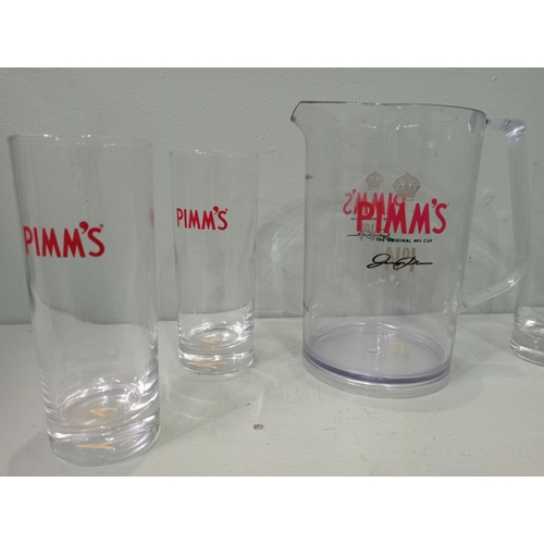 223A - Set of Pimms glasses and jug H 18cm x W 16cm x D 12cm Glass H 15cm. NOT AVAILABLE TO VIEW IN PERSON.