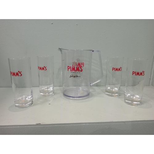 223A - Set of Pimms glasses and jug H 18cm x W 16cm x D 12cm Glass H 15cm. NOT AVAILABLE TO VIEW IN PERSON.