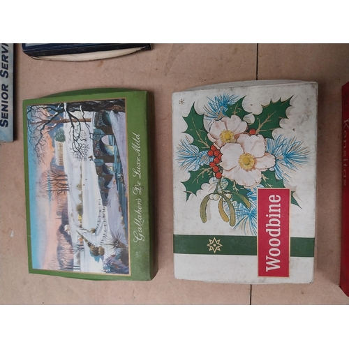 226 - Collection of seven Chrismas themed cigarette boxes � Gallaher�s, Player�s and Woodbine. {11 cm H x ... 