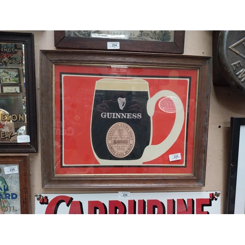 235 - Guinness Patrick Hanley of Waterford framed advertising print {42 cm H x 52 cm W}.