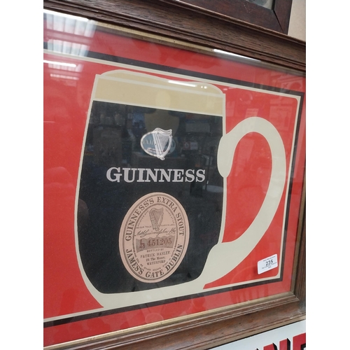 235 - Guinness Patrick Hanley of Waterford framed advertising print {42 cm H x 52 cm W}.