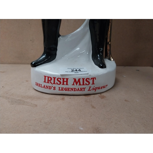 244 - Irish Mist Ireland's Legendary Liqueur ceramic advertising figure. {48 cm H x 15 cm W x 10 cm D}.