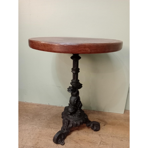 247 - Cast iron and mahogany pub table.  H 73cm x Dia 57cm. NOT AVAILABLE TO VIEW IN PERSON.