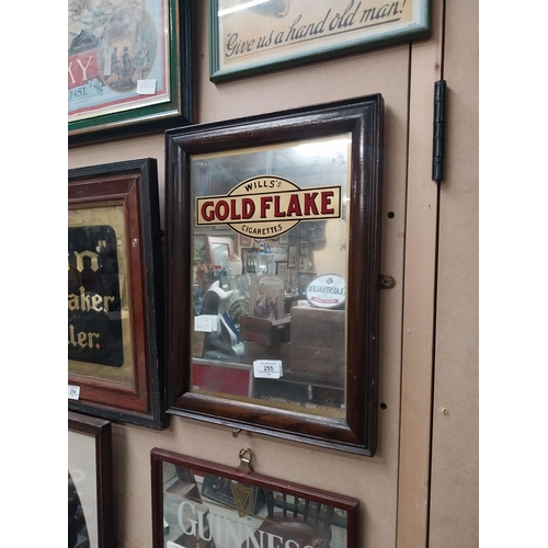 255 - Wills's Gold Flake Cigarettes framed advertising mirror. {41 cm H x 31 cm W}