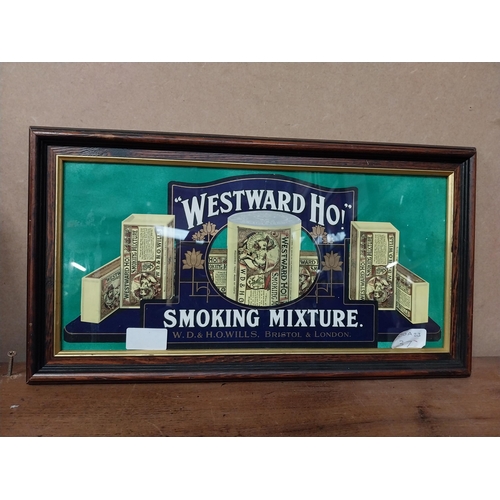 27 - Westward Ho framed showcard. {23 cm H x 14 cm W}.