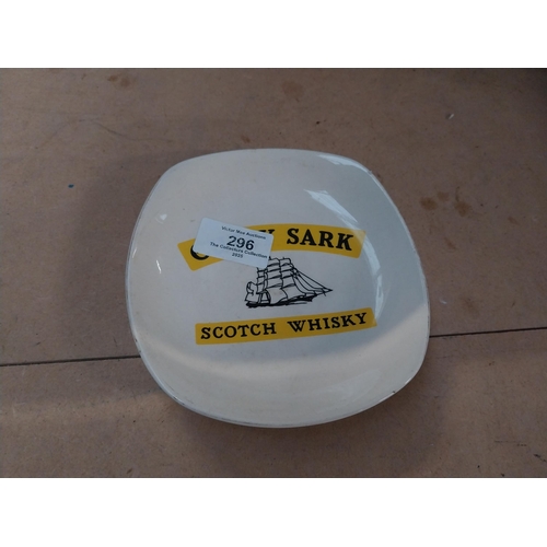 296 - Two Cutty Sark Scotch Whiskey Wade ceramic advertising ashtrays. {2 cm H x 14 cm W x 14 cm D}.