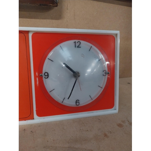 300 - Guinness Give Him a Guinness perspex light up advertising clock. {15 cm H  x 51 cm W x 5 cm D}.