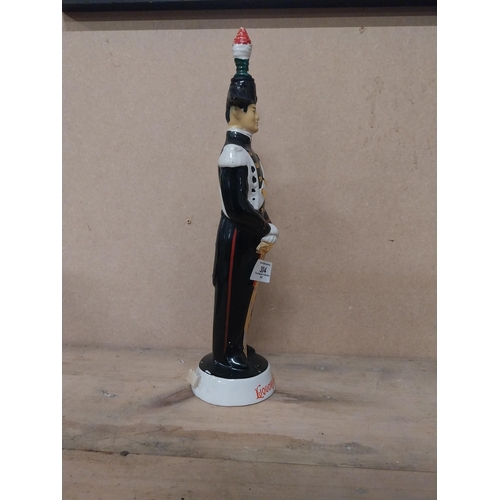 304 - Liquore Galliano advertising bottle in the form of a Guard. {35 cm H x 9 cm Dia.}.