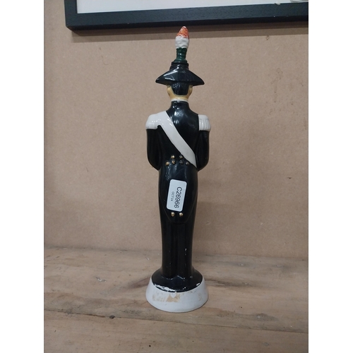 304 - Liquore Galliano advertising bottle in the form of a Guard. {35 cm H x 9 cm Dia.}.